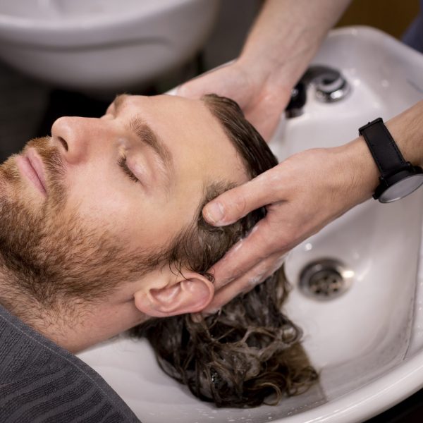 hairdresser-grooming-their-client